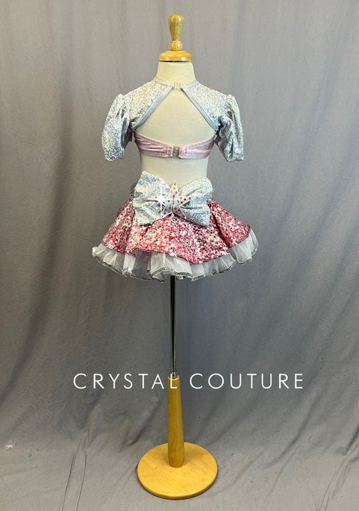 White Holographic Zsa Zsa Crop Top Attached to Baby Pink Trunks and Ruffle Skirt