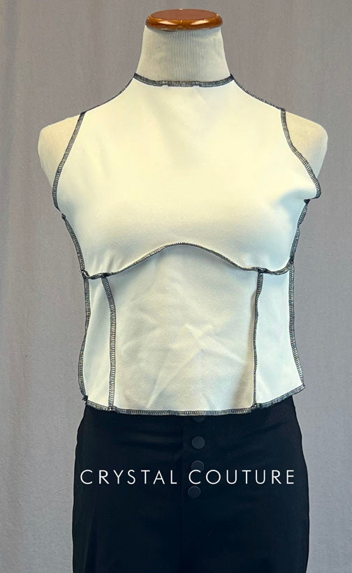 Custom Black High Waisted Pants And White Loose Fitting Top with Raw Edge Black Thread Seams.