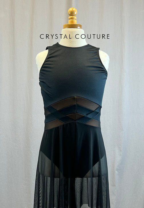 Black high neck leotard with nude accents and mesh shorts attached