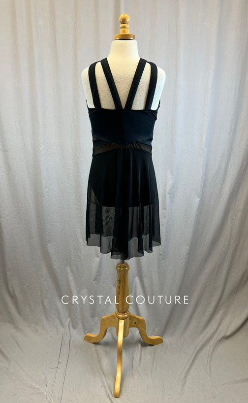 Black high neck leotard with nude accents and mesh shorts attached