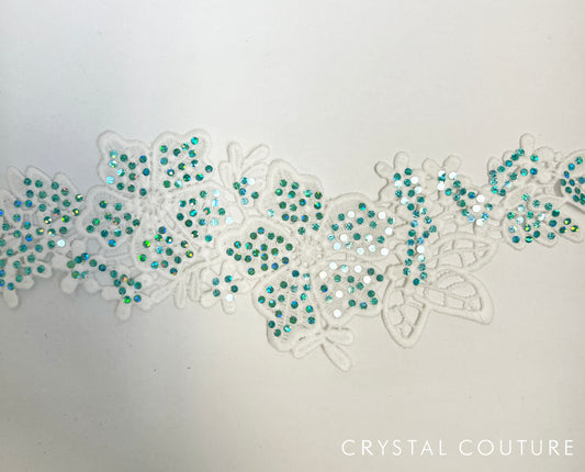 White Embroidered Floral Applique with Teal Holographic Spangles.
