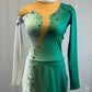 *Brand New* Green and white supplemented skating dress with black stars and sequins