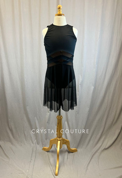 Black high neck leotard with nude accents and mesh shorts attached