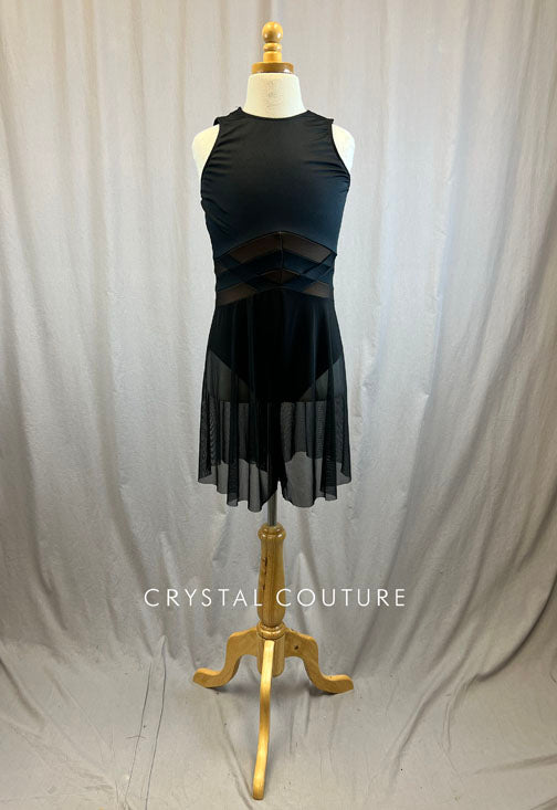 Black high neck leotard with nude accents and mesh shorts attached