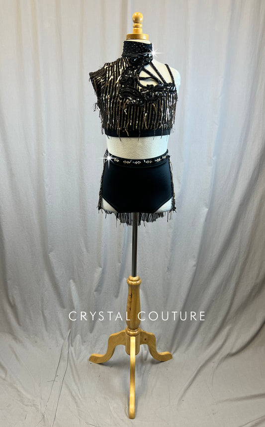 Black and gold sequin mock neck set with black applique embellishment. -Rhinestones