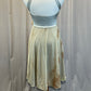 Silver Mock Neck Leotard with Cream/Tan Mesh Skirt, and Draping.